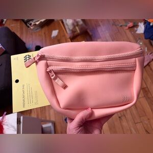 Brand new all in motion blush colored belt bag